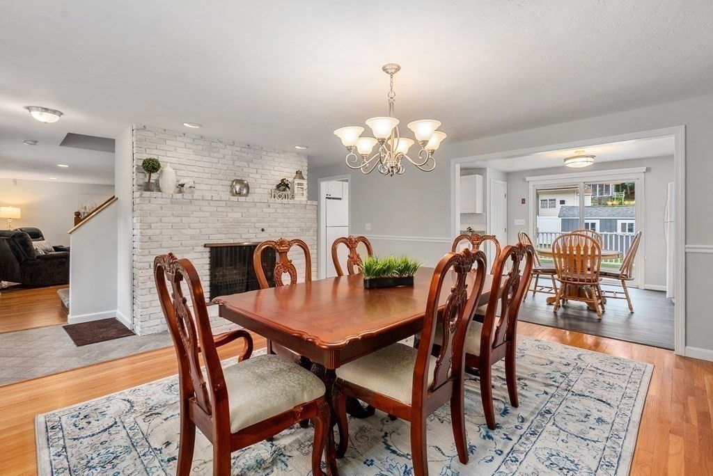 12 Cypress Road Natick, MA 01760 - Photo 3 of 41 a view of a dining room with furniture and wooden floor
