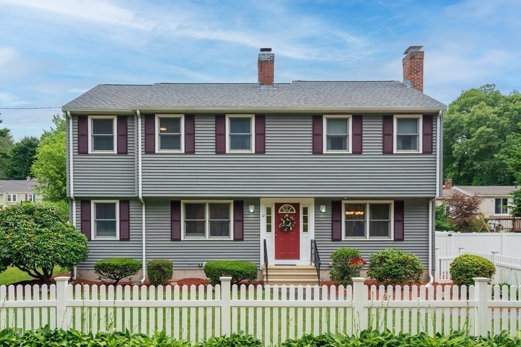 12 Cypress Road Natick, MA 01760 - Photo 41 of 41 a front view of a house with a garden