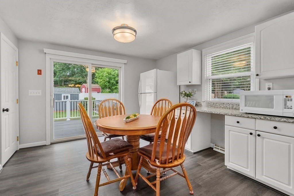 12 Cypress Road Natick, MA 01760 - Photo 7 of 41 a view of a dining room with furniture window and outside view
