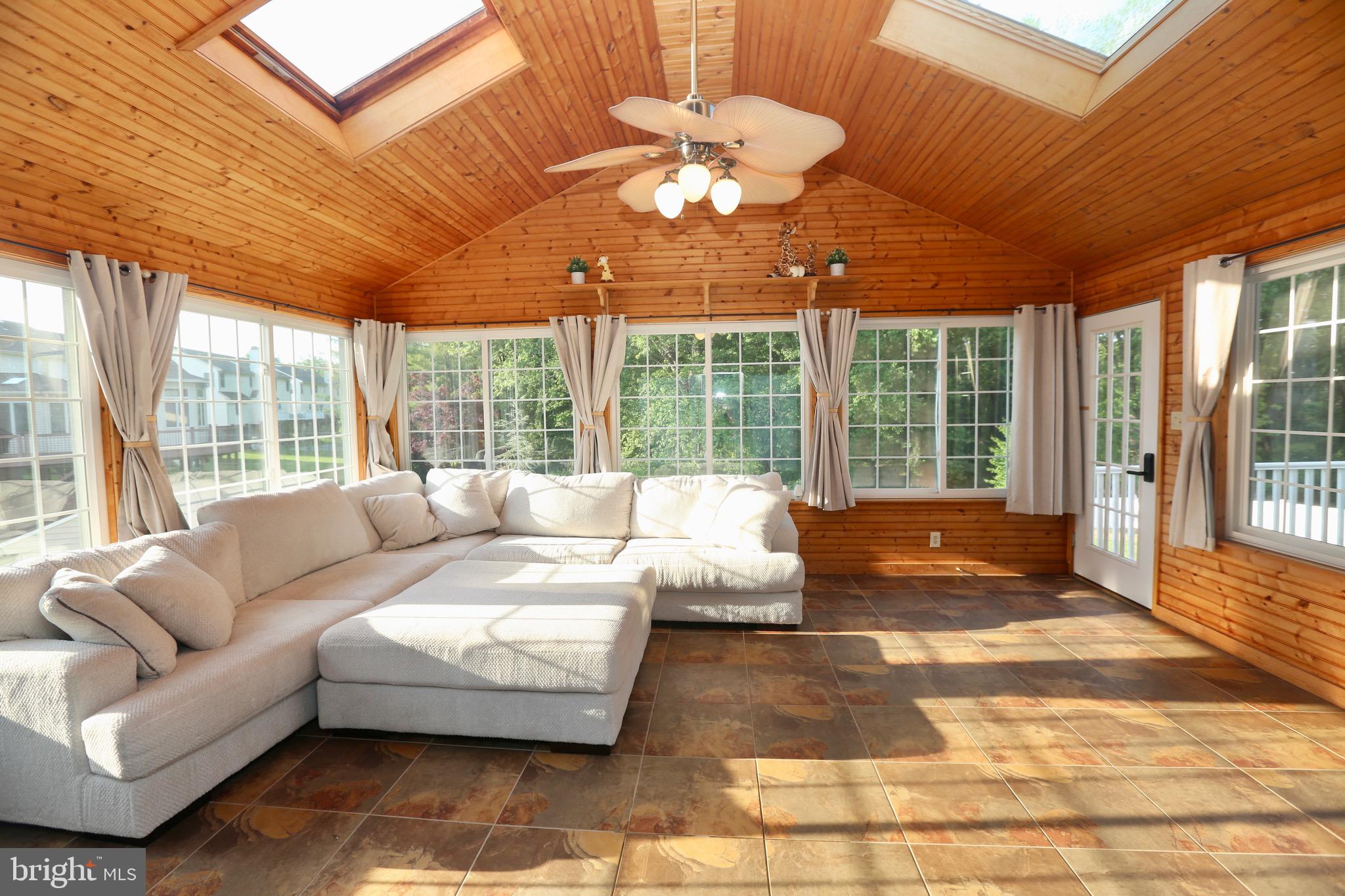 16 Cotswold Way Sewell, NJ 08080 - Photo 20 of 52 a living room with furniture and a large window