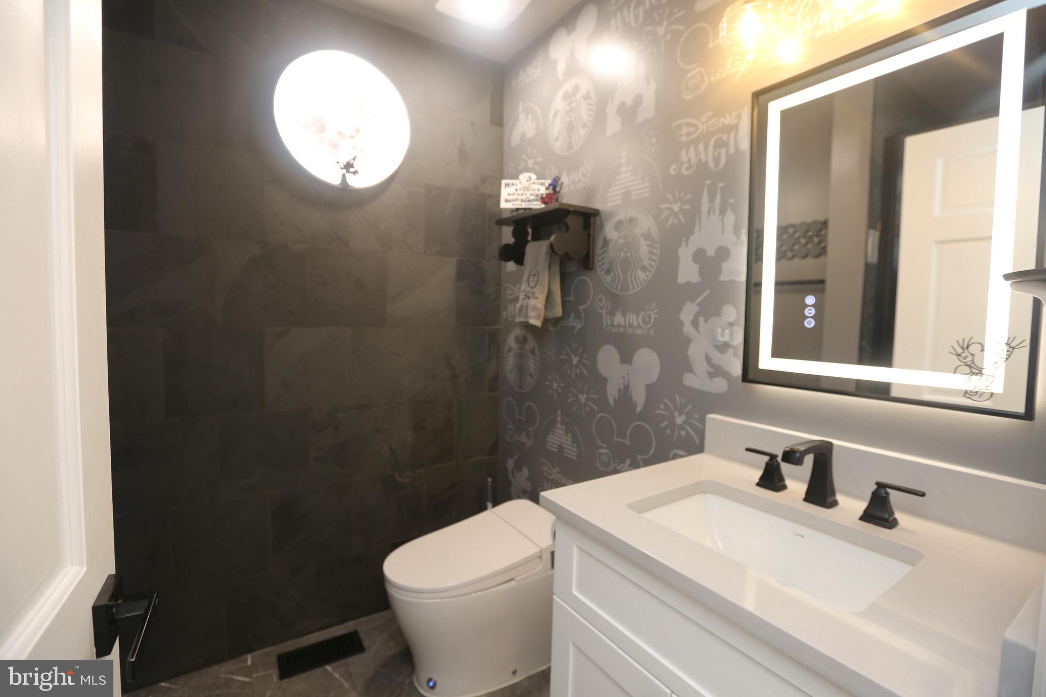 16 Cotswold Way Sewell, NJ 08080 - Photo 21 of 52 a bathroom with a sink a toilet and shower
