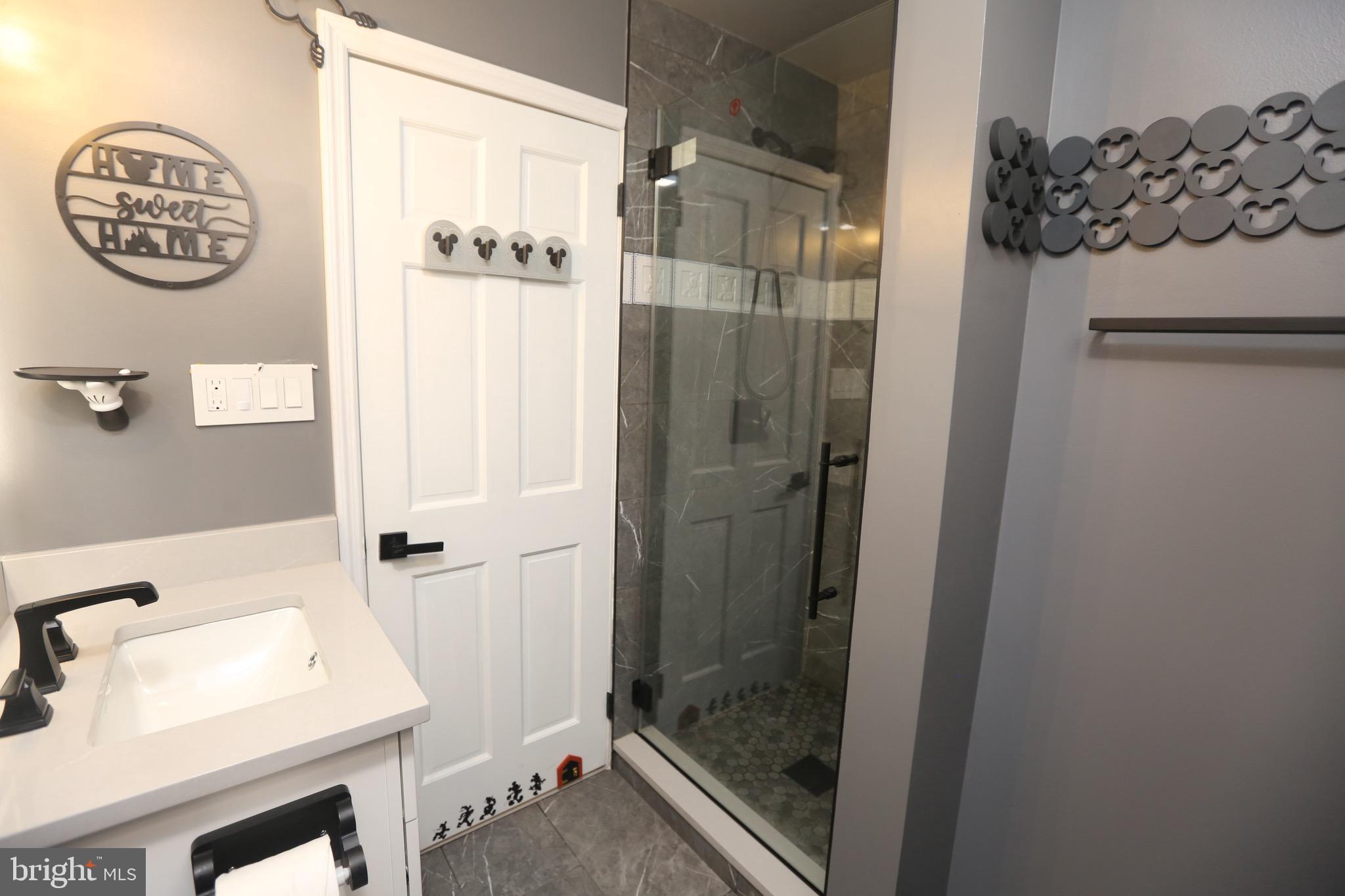 16 Cotswold Way Sewell, NJ 08080 - Photo 22 of 52 a bathroom with a shower and a sink