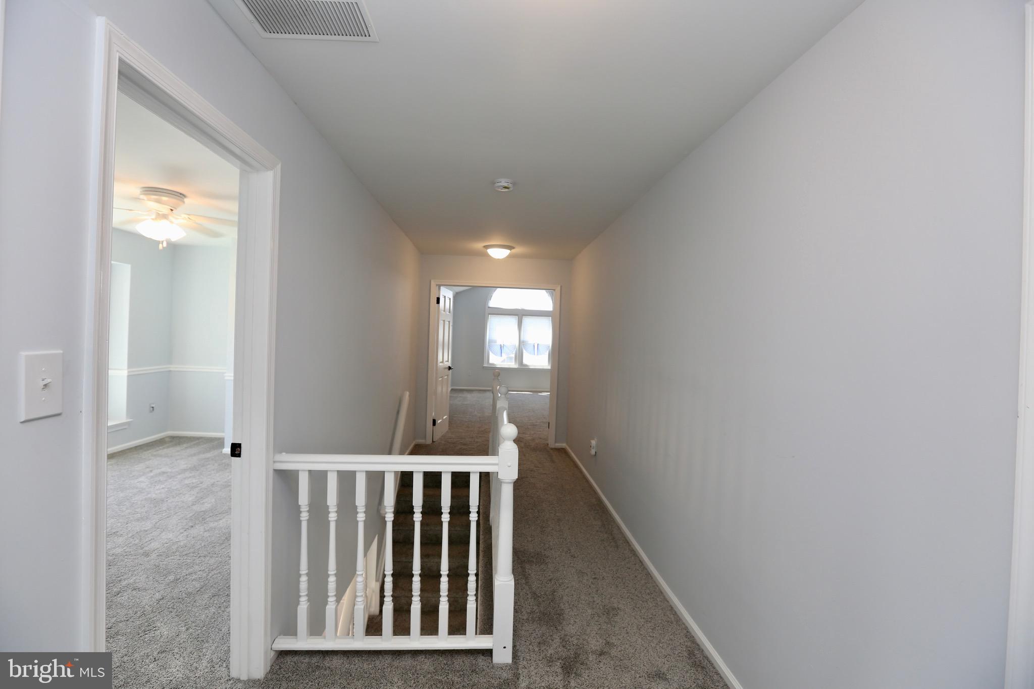 16 Cotswold Way Sewell, NJ 08080 - Photo 25 of 52 a view of entryway and hall with wooden floor