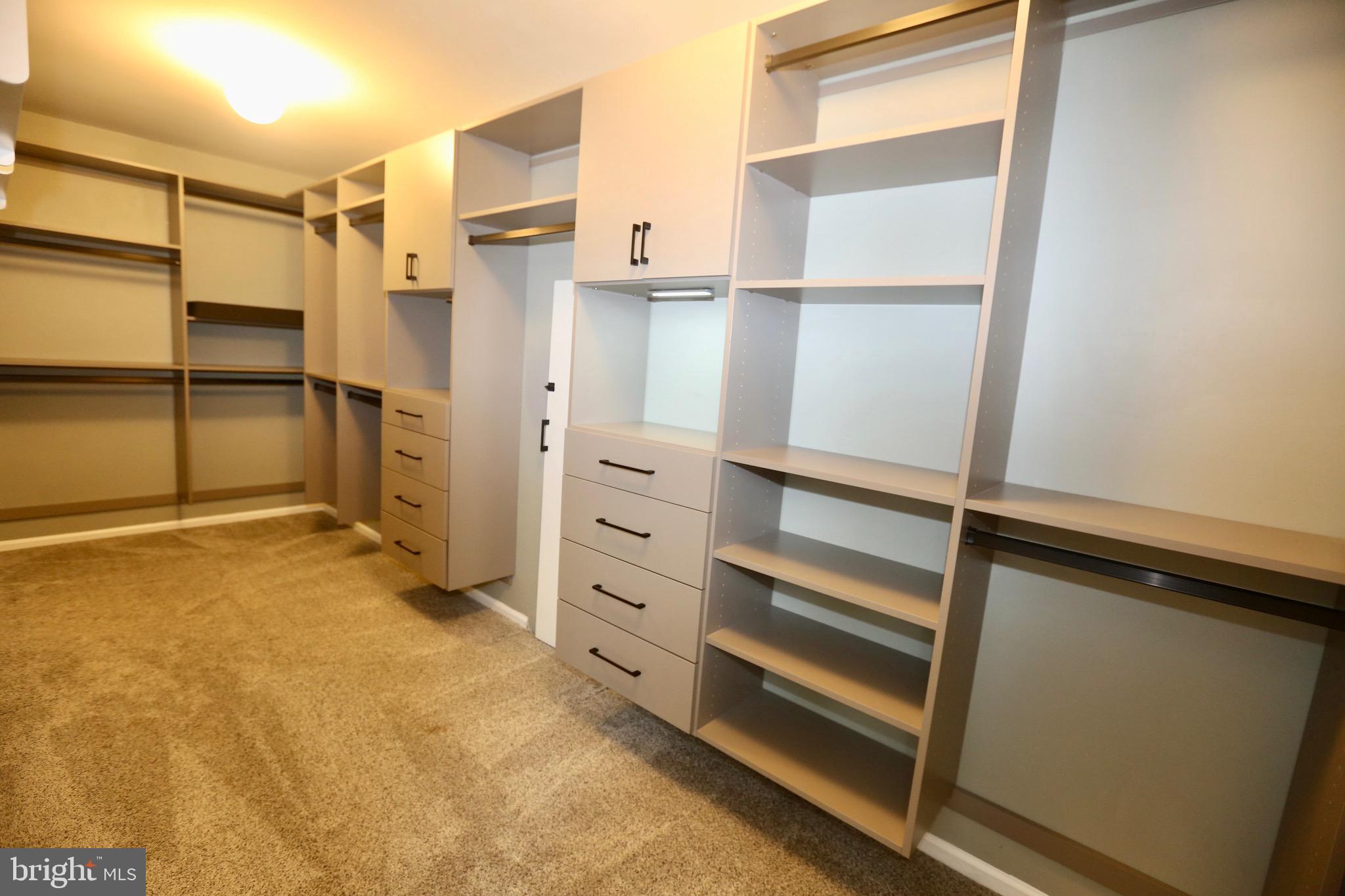 16 Cotswold Way Sewell, NJ 08080 - Photo 30 of 52 a view of walk in closet with empty racks