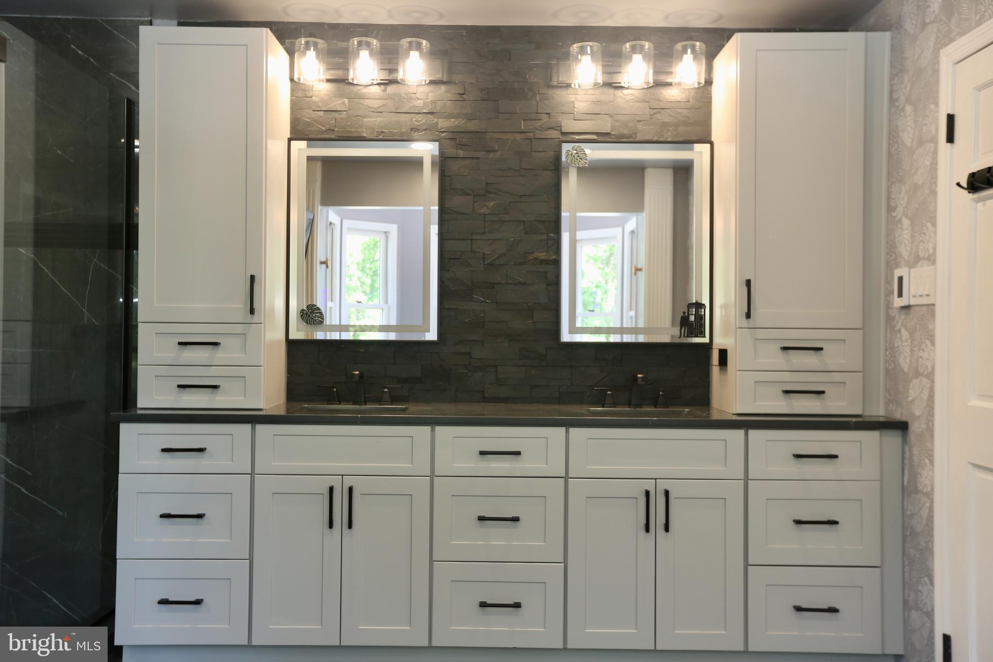 16 Cotswold Way Sewell, NJ 08080 - Photo 33 of 52 a bathroom with white cabinets and a sink