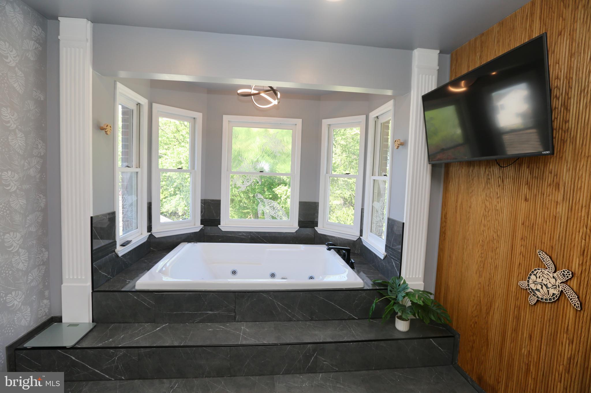 16 Cotswold Way Sewell, NJ 08080 - Photo 36 of 52 a view of a livingroom with furniture and floor to ceiling window