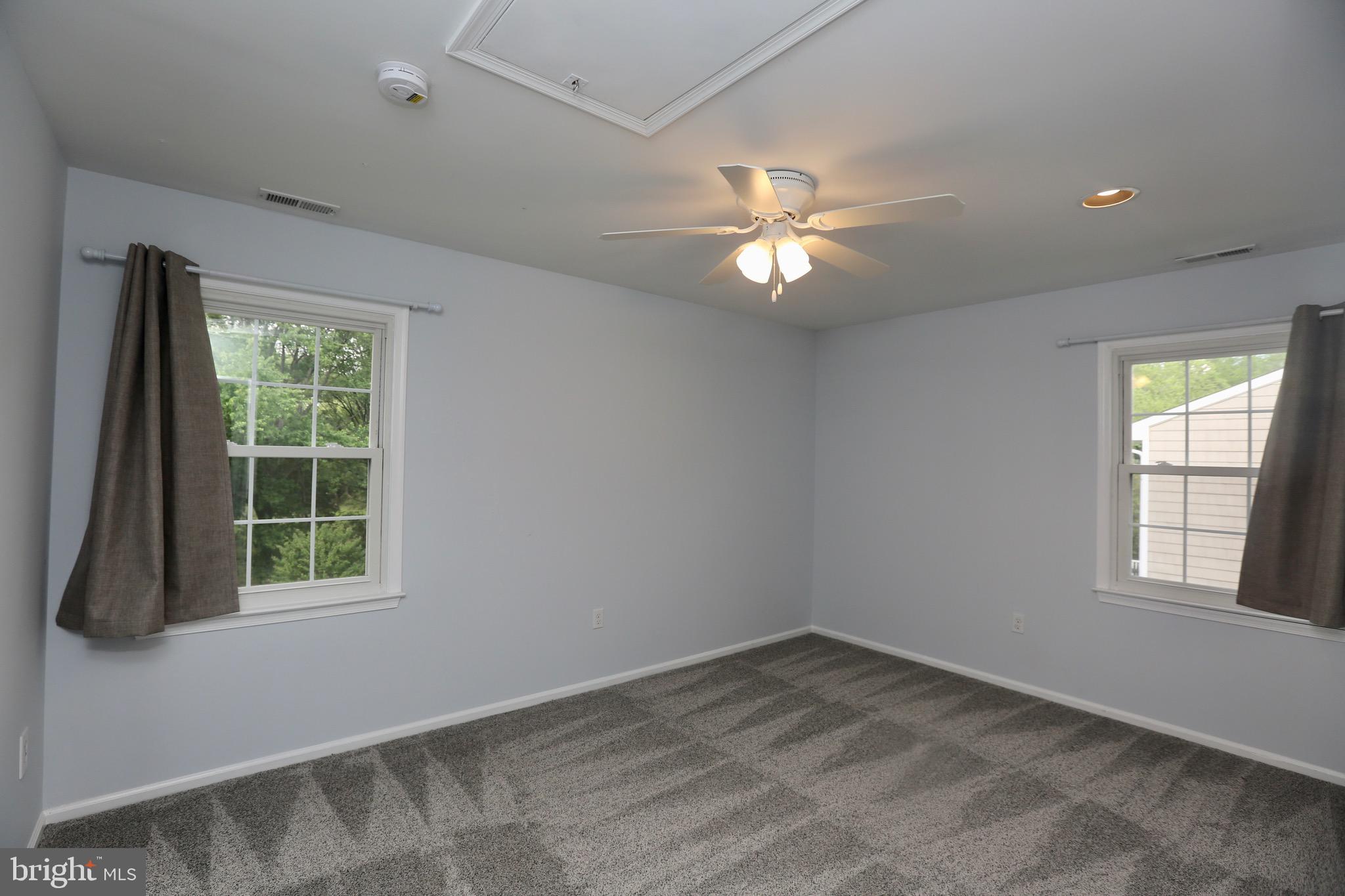 16 Cotswold Way Sewell, NJ 08080 - Photo 38 of 52 an empty room with a window