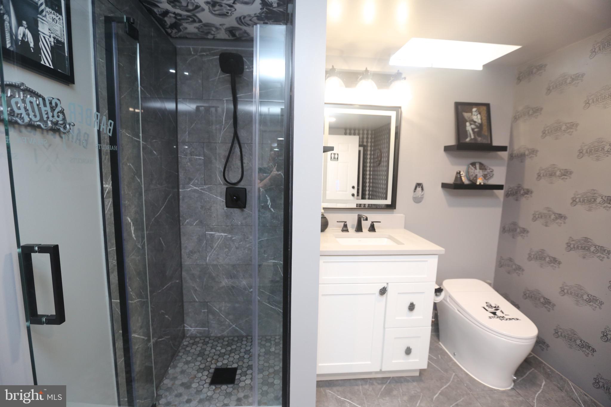 16 Cotswold Way Sewell, NJ 08080 - Photo 49 of 52 a bathroom with a sink a toilet and shower