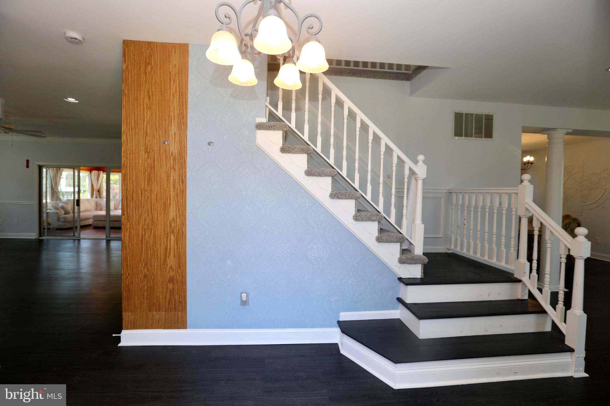 16 Cotswold Way Sewell, NJ 08080 - Photo 5 of 52 a view of entryway and hall with wooden floor