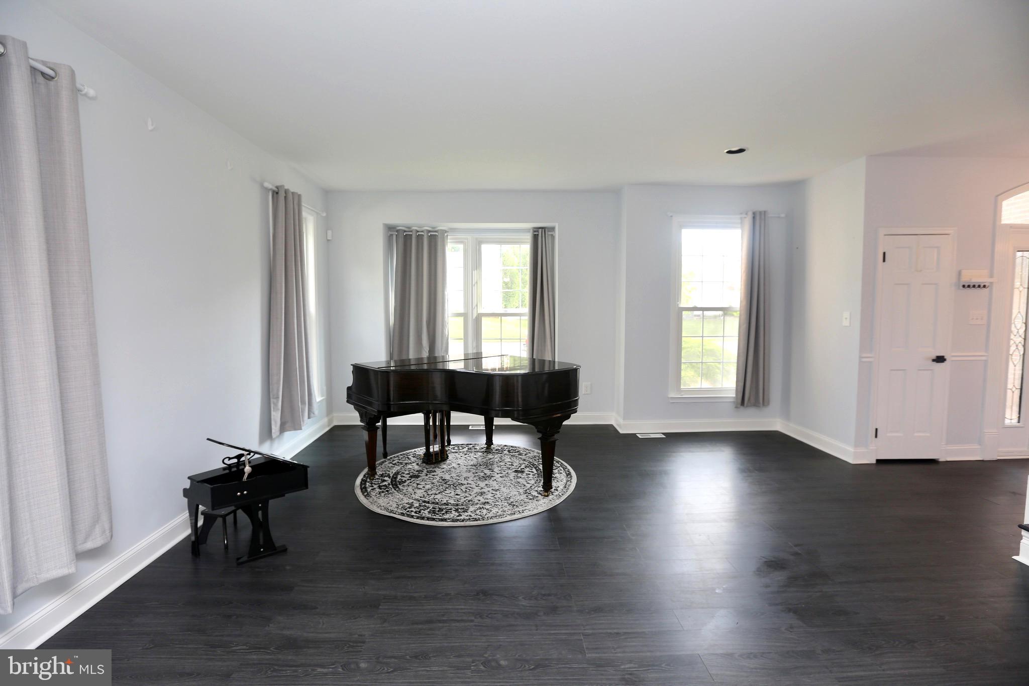 16 Cotswold Way Sewell, NJ 08080 - Photo 8 of 52 a view of a dining room with furniture and wooden floor