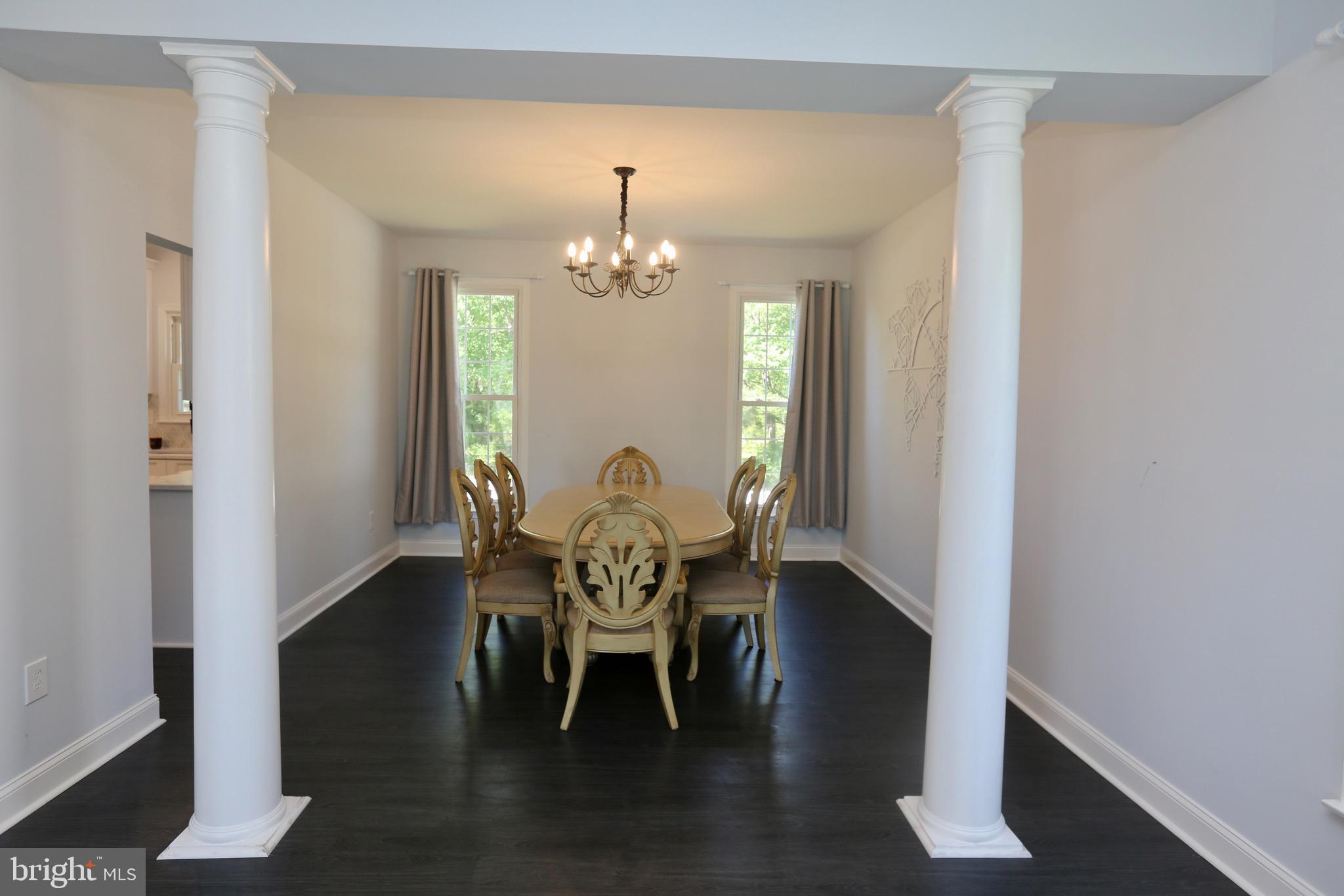 16 Cotswold Way Sewell, NJ 08080 - Photo 9 of 52 a view of a dining room with furniture and chandelier
