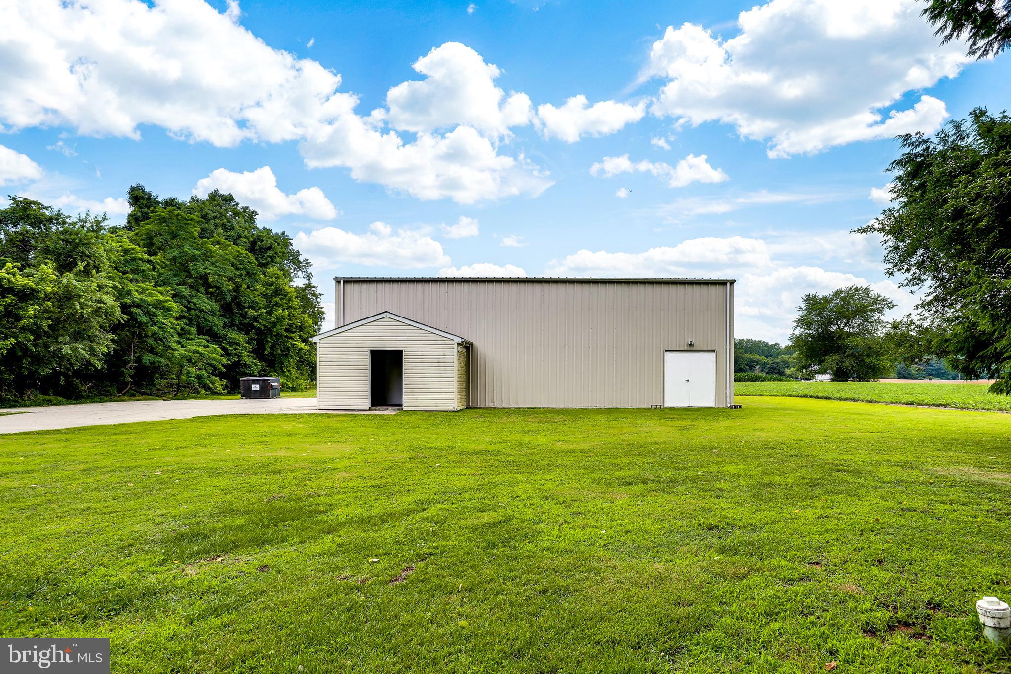 Large industrial garage at rear of property