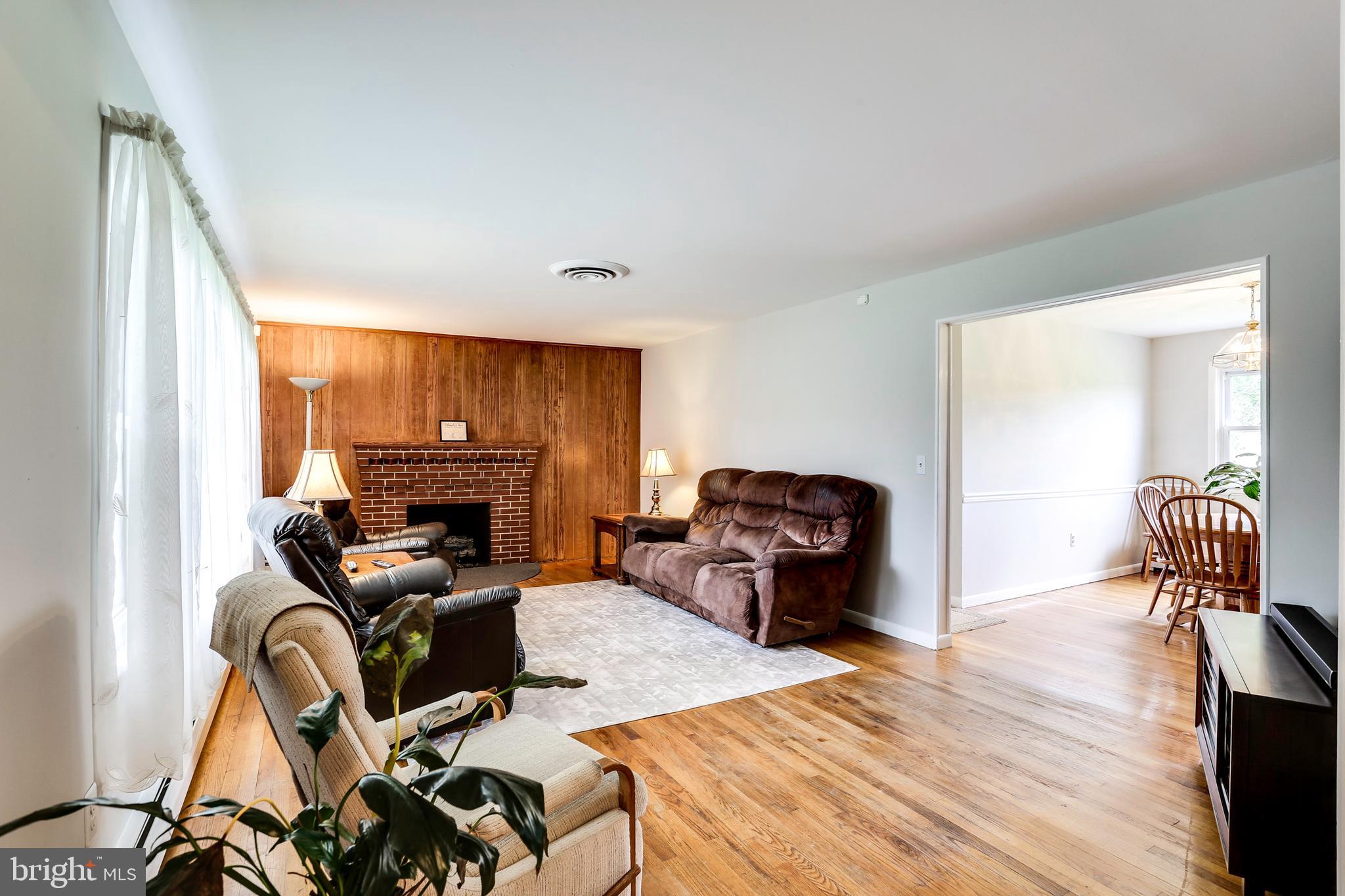 4930 Solomons Island Road Harwood, MD 20776 - Photo 11 of 31 Living Room open to Dining Room