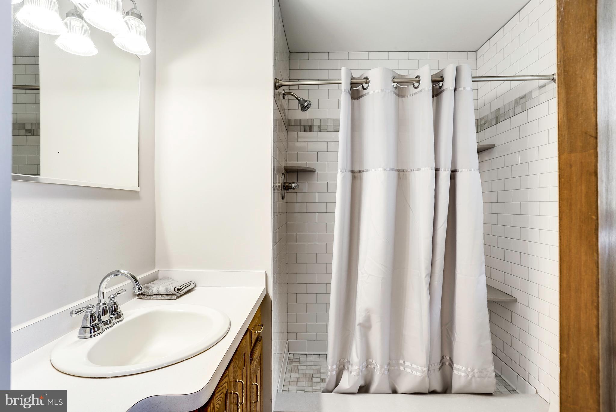 4930 Solomons Island Road Harwood, MD 20776 - Photo 14 of 31 Remodeled Master Bath