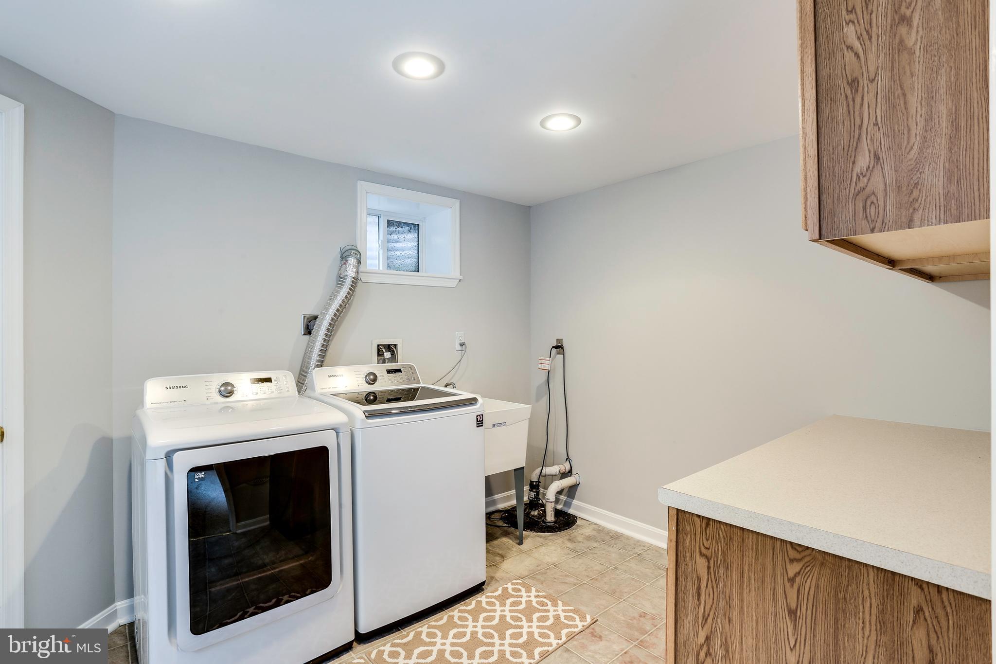 4930 Solomons Island Road Harwood, MD 20776 - Photo 22 of 31 Large Laundry Room in basement