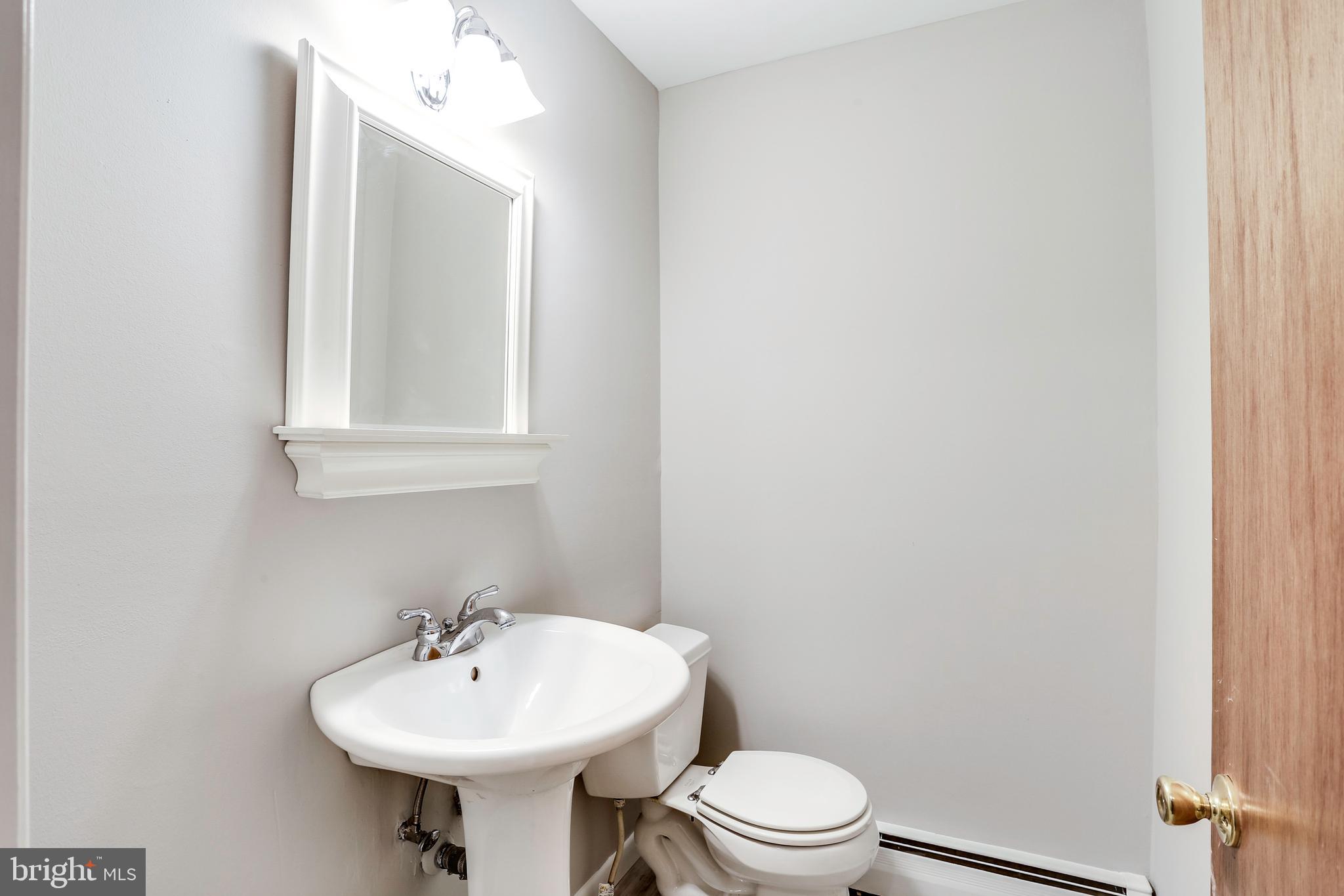 4930 Solomons Island Road Harwood, MD 20776 - Photo 23 of 31 Main level Powder Room