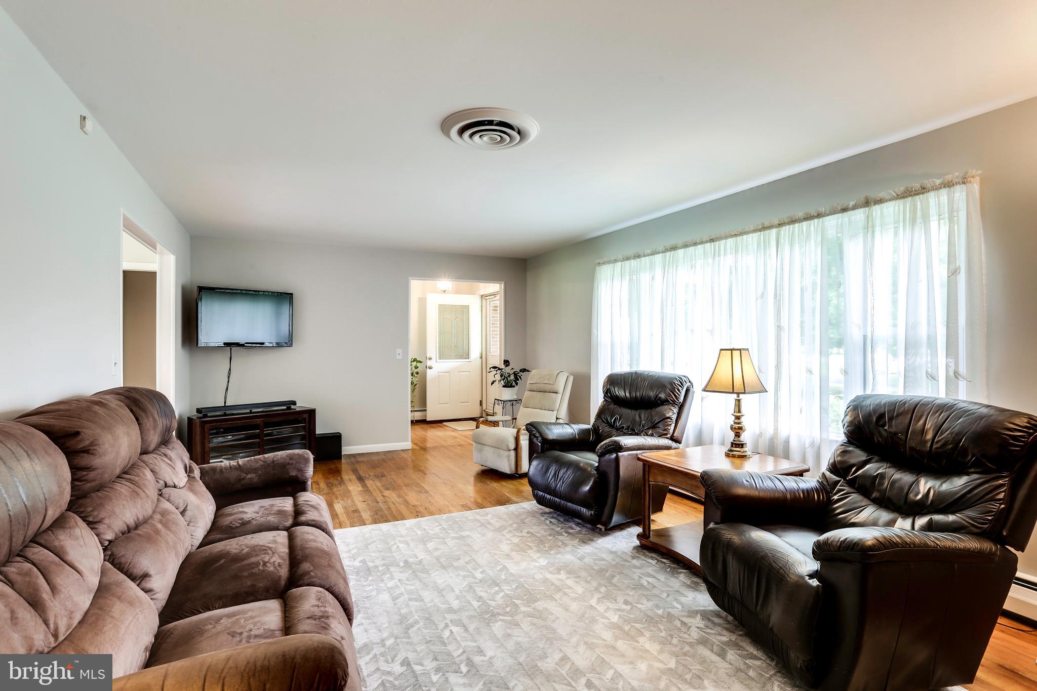 4930 Solomons Island Road Harwood, MD 20776 - Photo 8 of 31 Living Room with lots of light