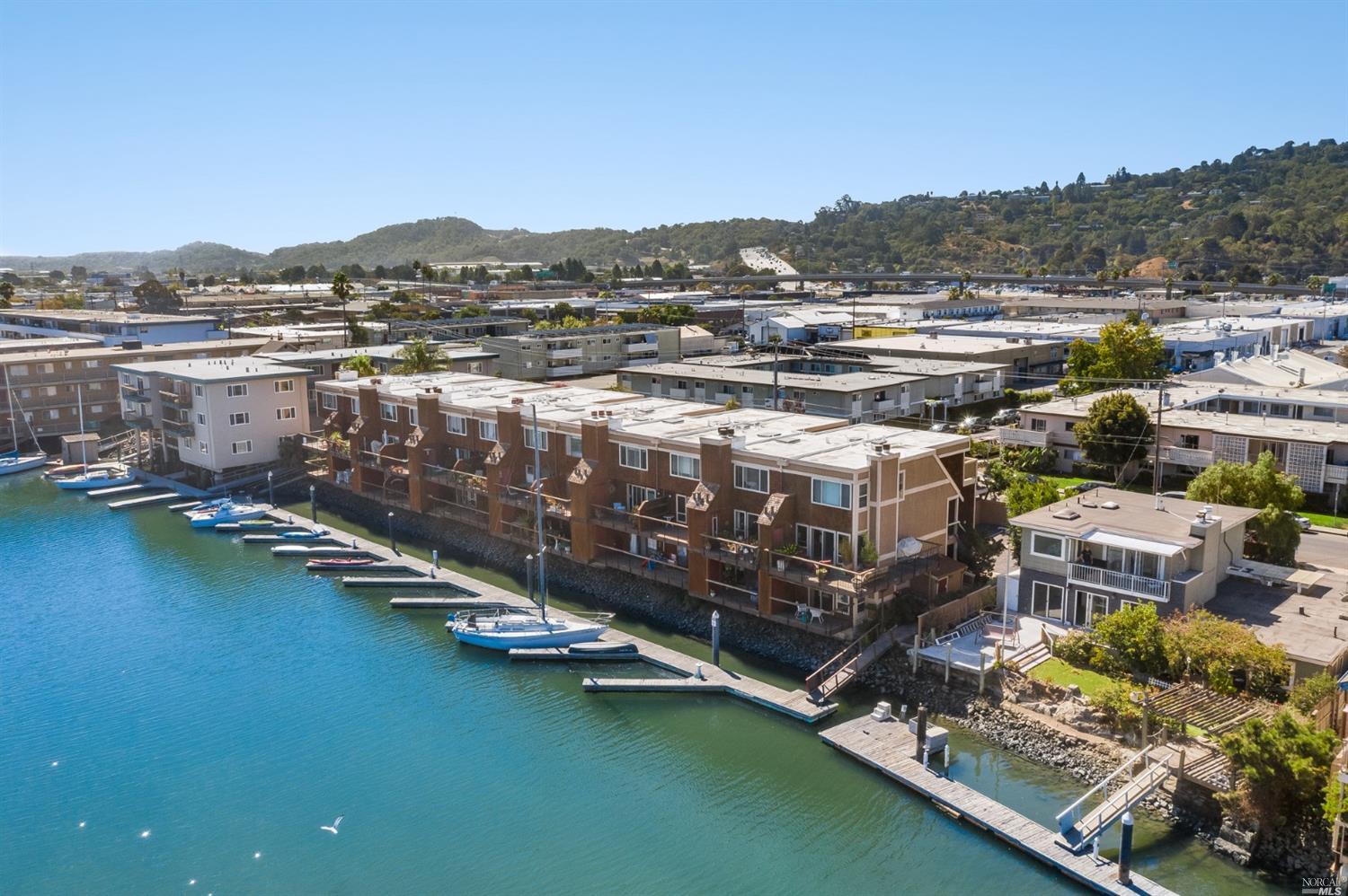 a view of a city with tall buildings in the background