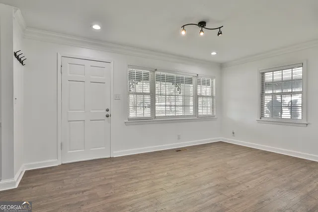 a view of kitchen with wooden floor