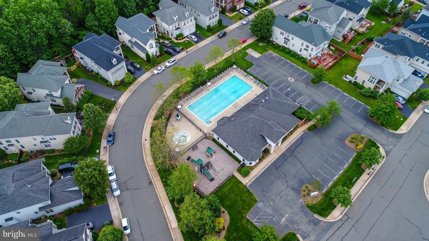 8362 Gaither Street Manassas, VA 20110 - Photo 4 of 8 an aerial view of a house with a swimming pool