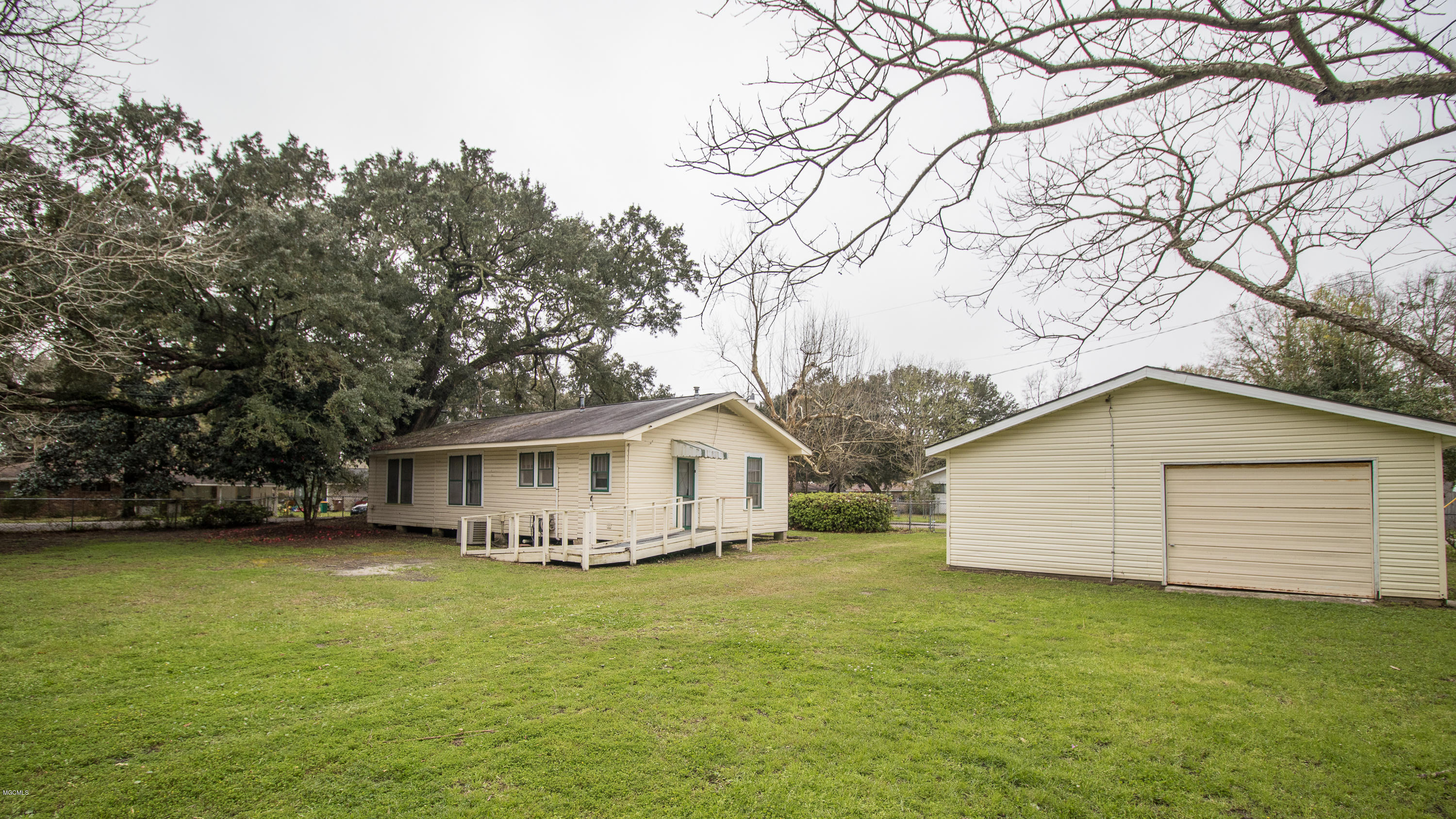 601 East Old Pass Road Long Beach, MS 39560 - Photo 14 of 16 Backyard view of house and large garage
