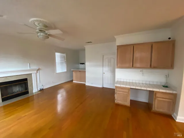 a kitchen with a sink cabinets and appliances