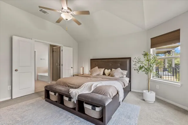 a bedroom with a bed dresser and a window