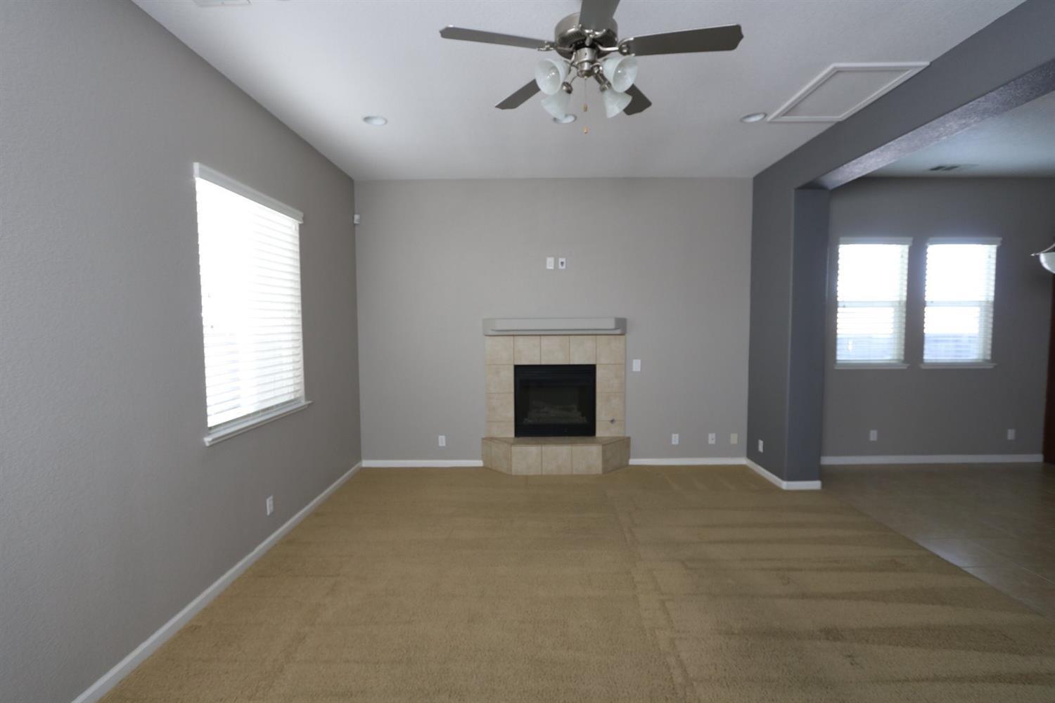 1709 Thomas Court Modesto, CA 95355 - Photo 8 of 11 a view of an empty room with a window