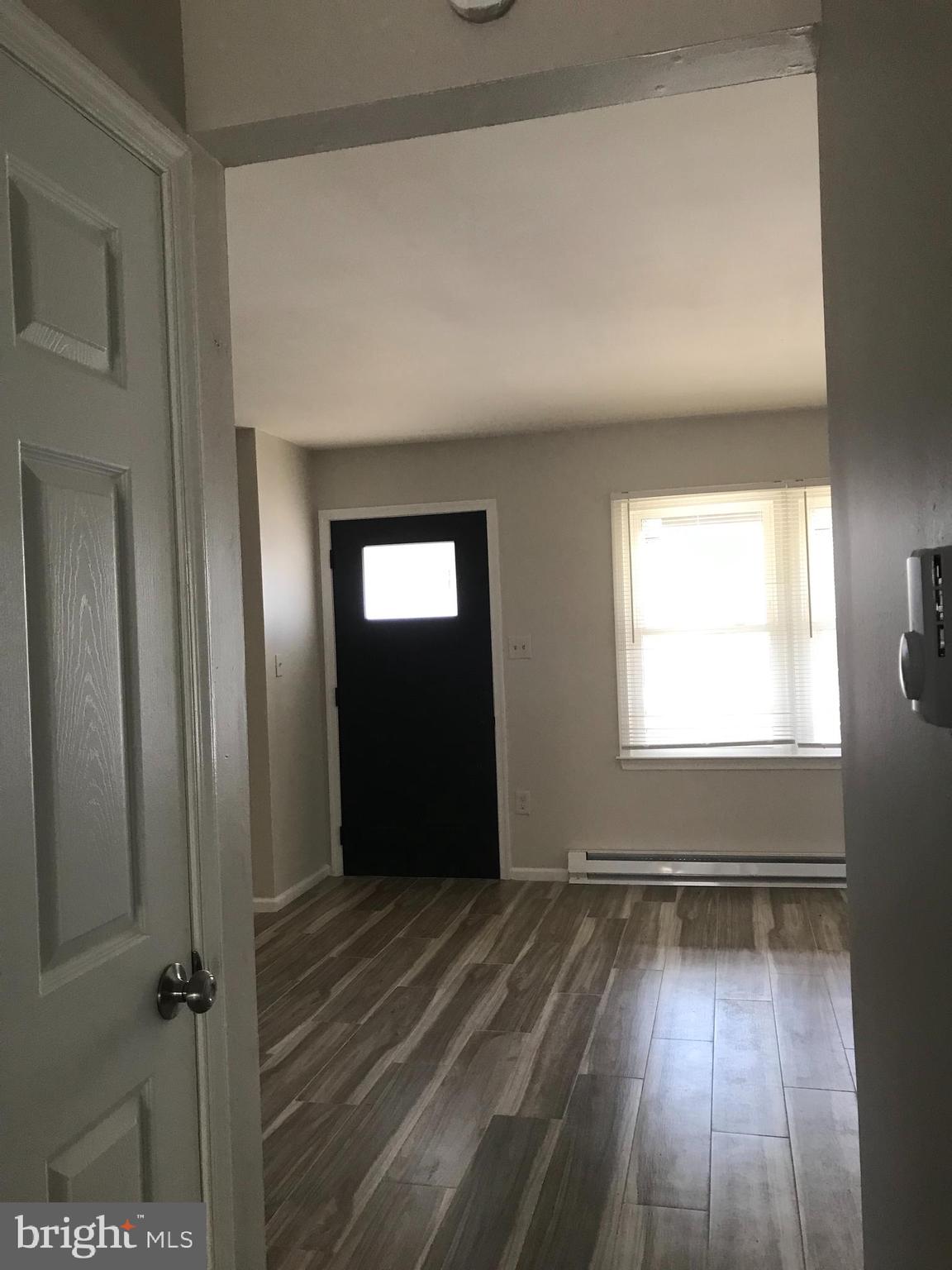 107 North Church Street Charles Town, WV 25414 - Photo 15 of 26 a view of an empty room and window