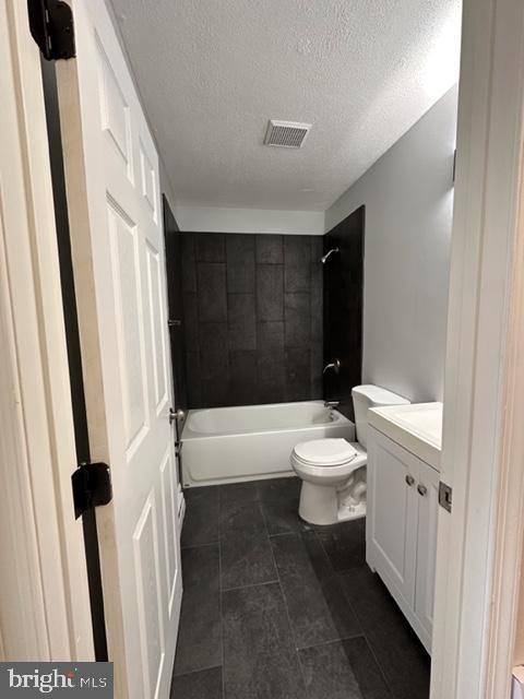 107 North Church Street Charles Town, WV 25414 - Photo 20 of 26 a bathroom with a sink a toilet and shower
