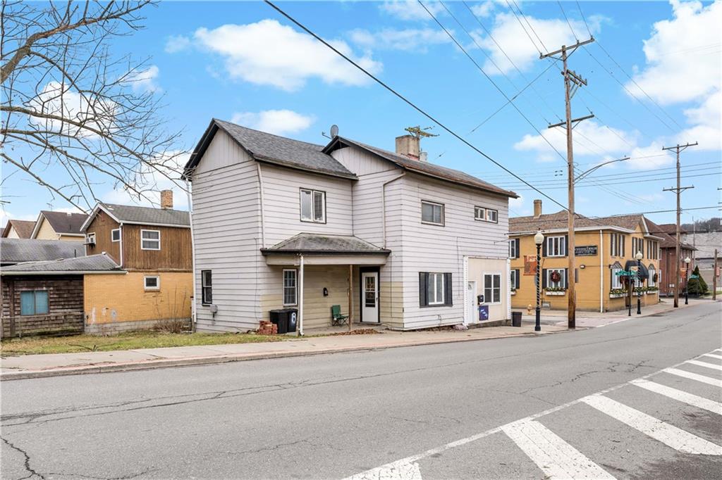 301 1st Avenue Carnegie, PA 15106 - Photo 2 of 40 a view of a street with houses