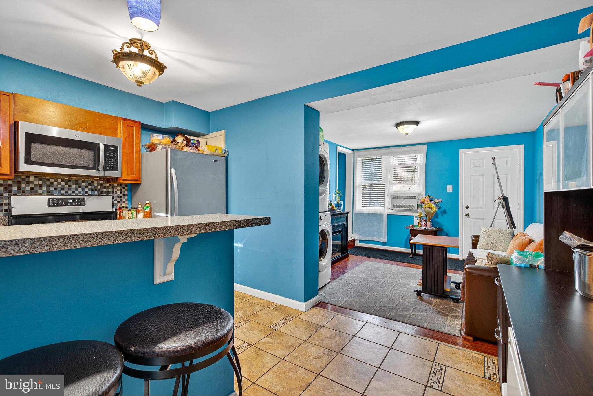 1109 Quantril Way Baltimore, MD 21205 - Photo 5 of 18 Vibrant kitchen with open living space.