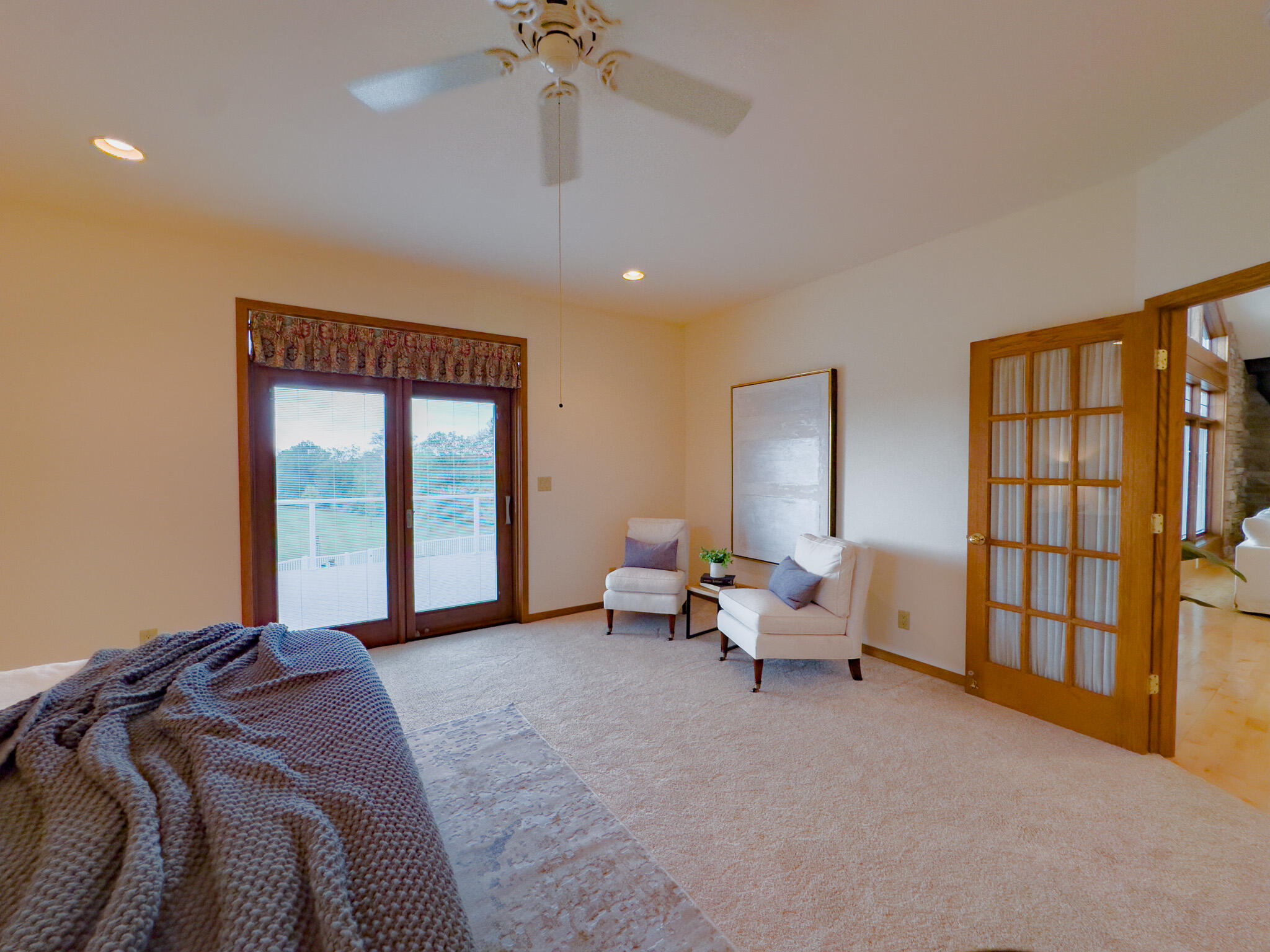 11604 North Granville Road Mequon, WI 53097 - Photo 22 of 49 Patio doors lead to the rear deck.