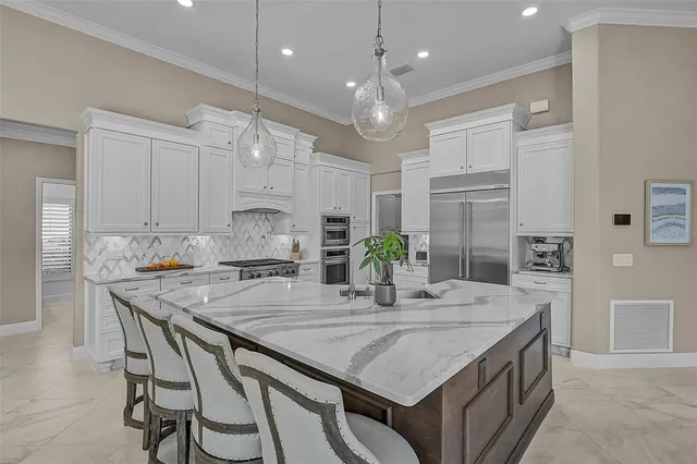 a living room with fireplace furniture and a flat screen tv