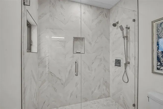 a view of a kitchen from the hallway