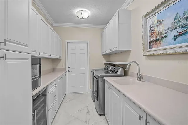 an aerial view of a house with outdoor space pool seating area and yard