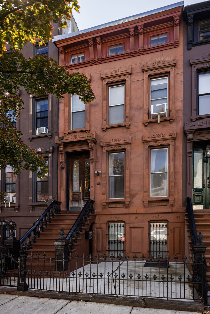 490 Monroe Street Brooklyn, NY 11221 - Photo 3 of 15 a front view of a multi story residential apartment building