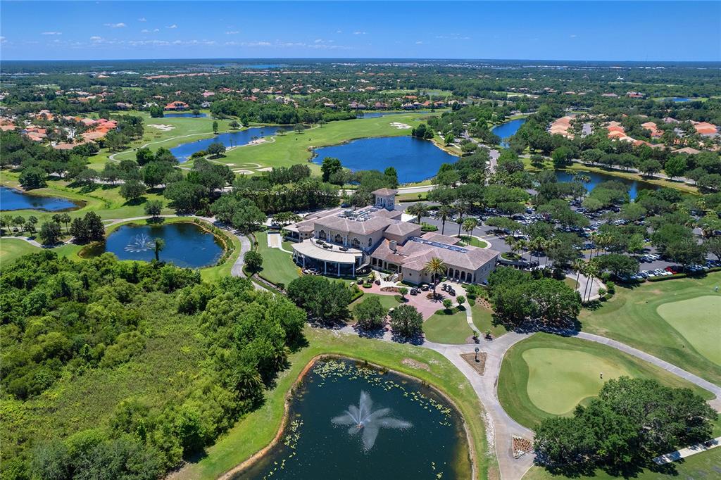 7431 Greystone Street Lakewood Ranch, FL 34202 - Photo 78 of 85 an aerial view of residential houses with outdoor space and swimming pool