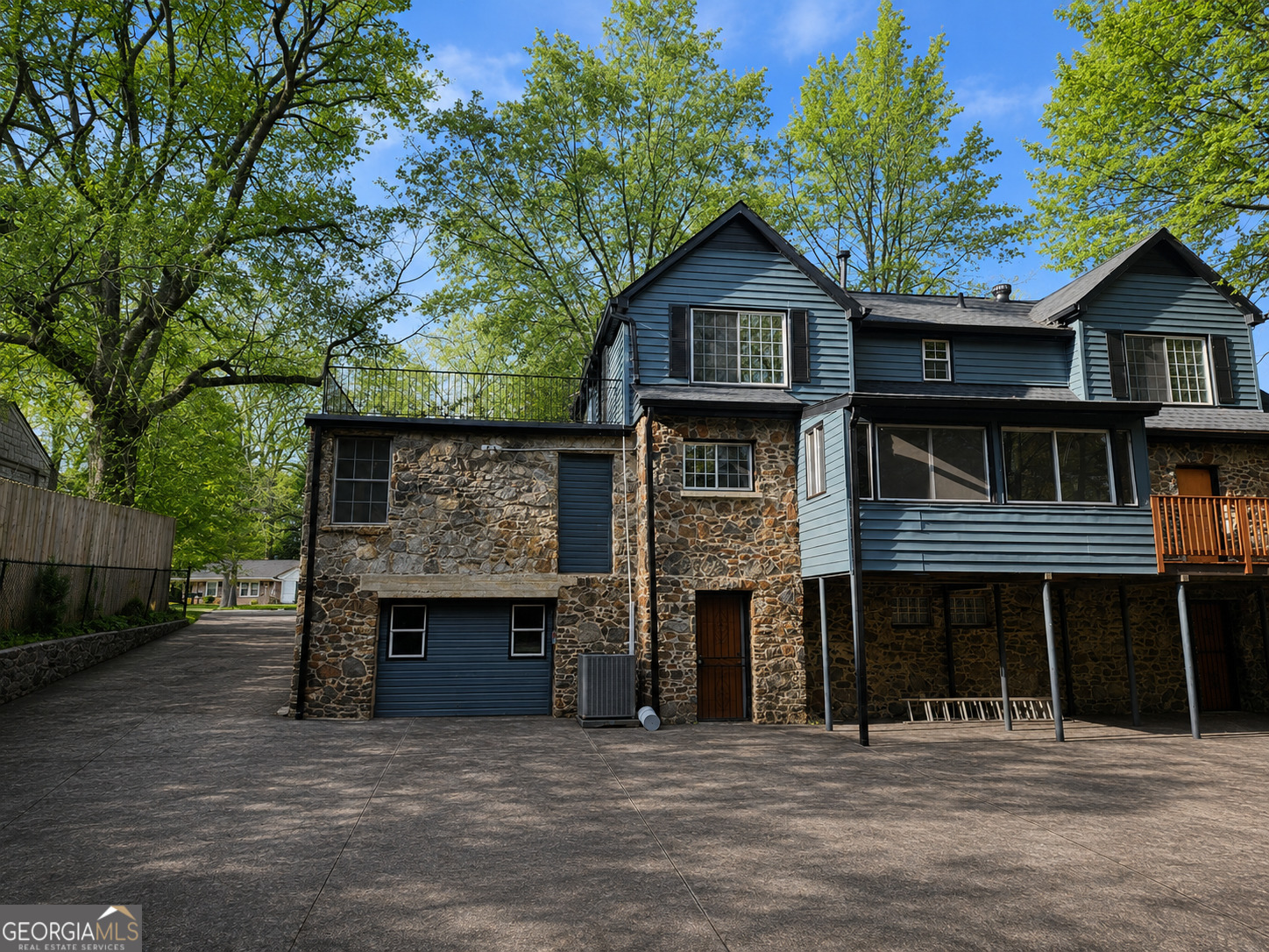 1114 Fayetteville Road Southeast Atlanta, GA 30316 - Photo 22 of 26 a front view of a house with a garden