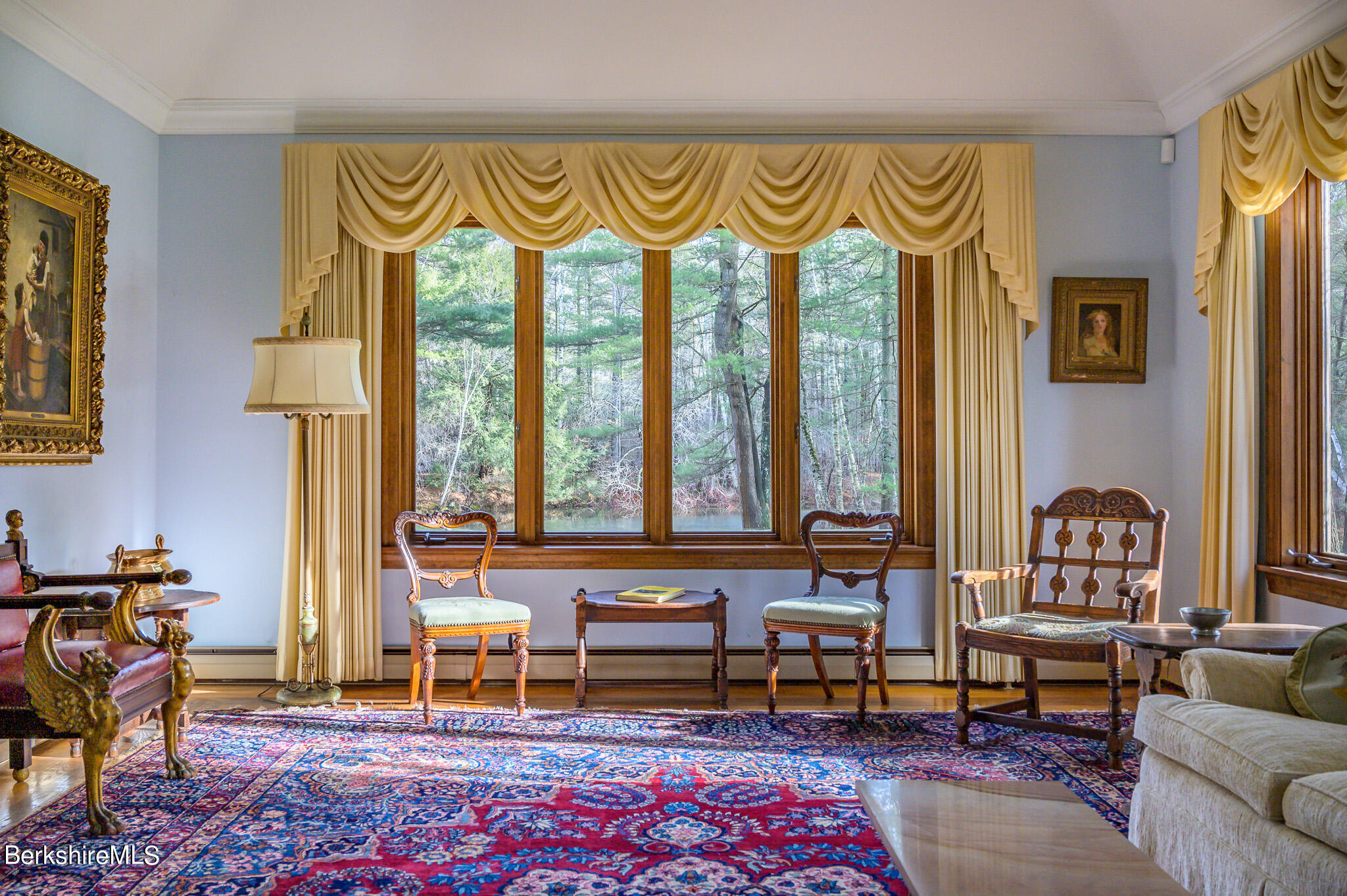 462 E Road Richmond, MA 01254 - Photo 13 of 49 a living room with furniture and a floor to ceiling window
