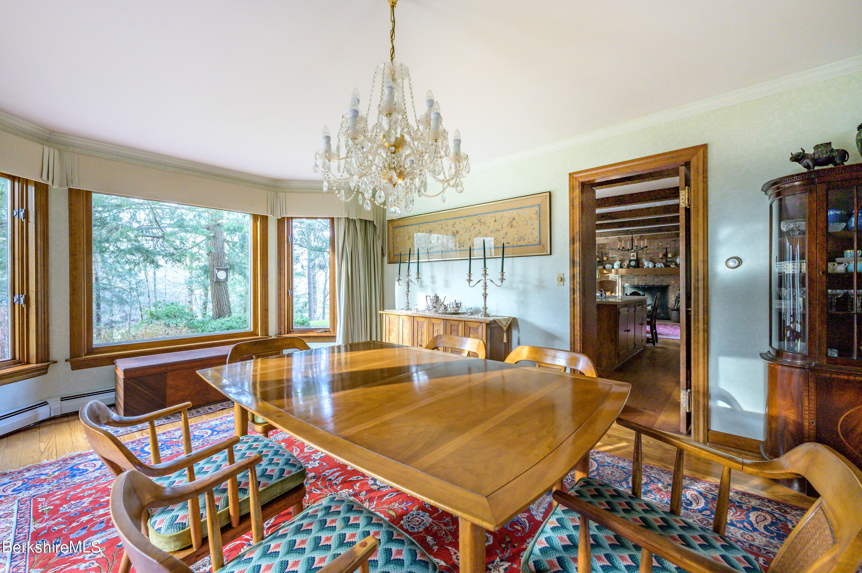 462 E Road Richmond, MA 01254 - Photo 14 of 49 a living room with furniture a chandelier and a table