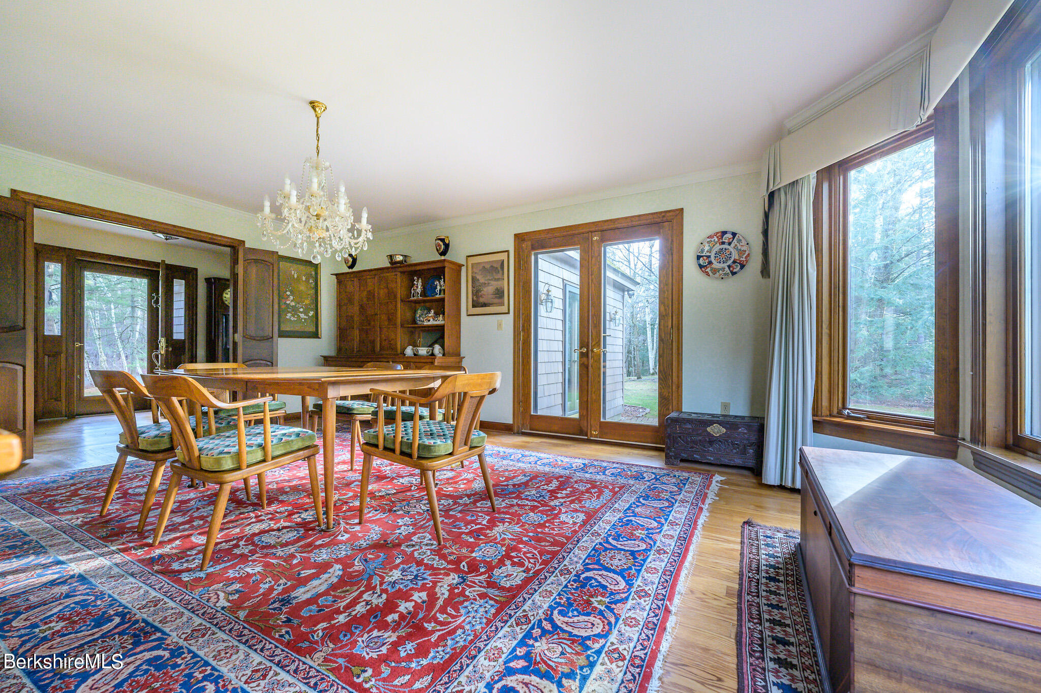 462 E Road Richmond, MA 01254 - Photo 15 of 49 a view of a dining room with furniture and wooden floor