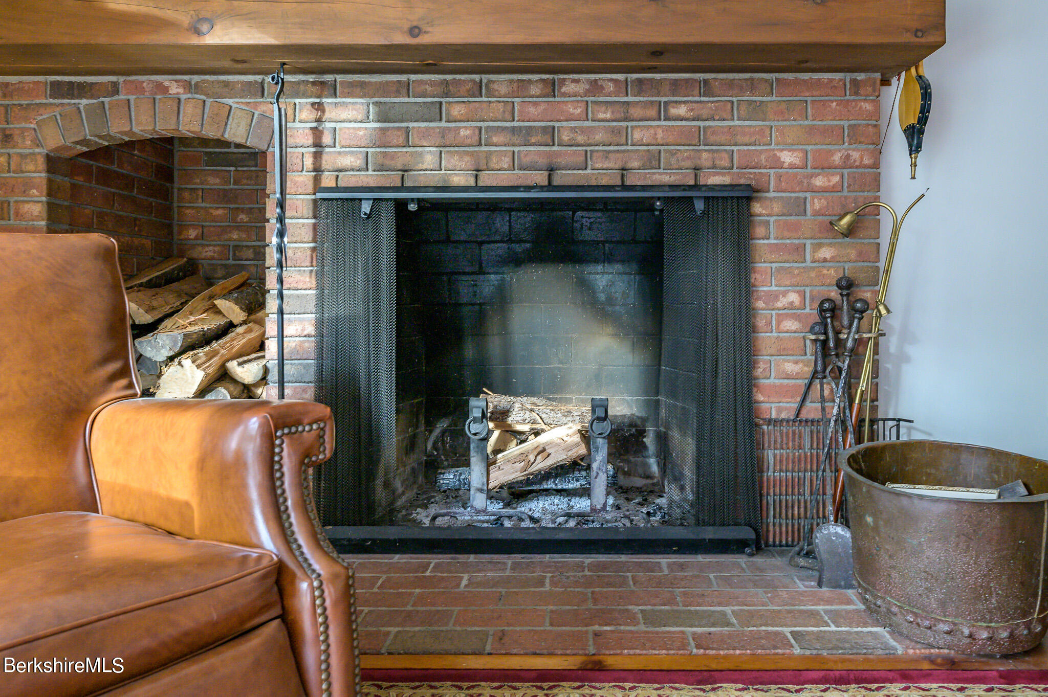 462 E Road Richmond, MA 01254 - Photo 22 of 49 a living room with furniture and a fireplace