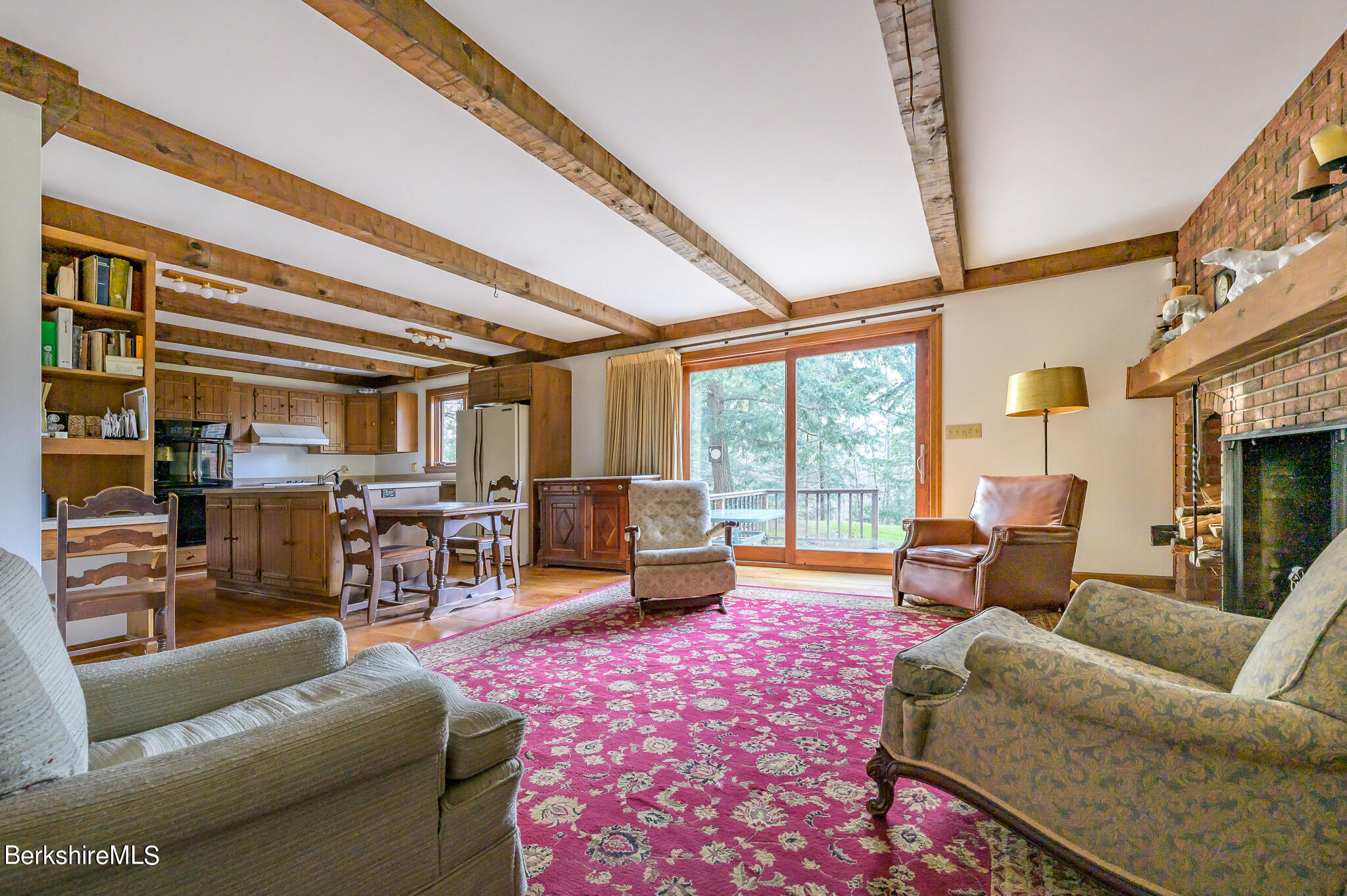 462 E Road Richmond, MA 01254 - Photo 23 of 49 a living room with furniture and a floor to ceiling window