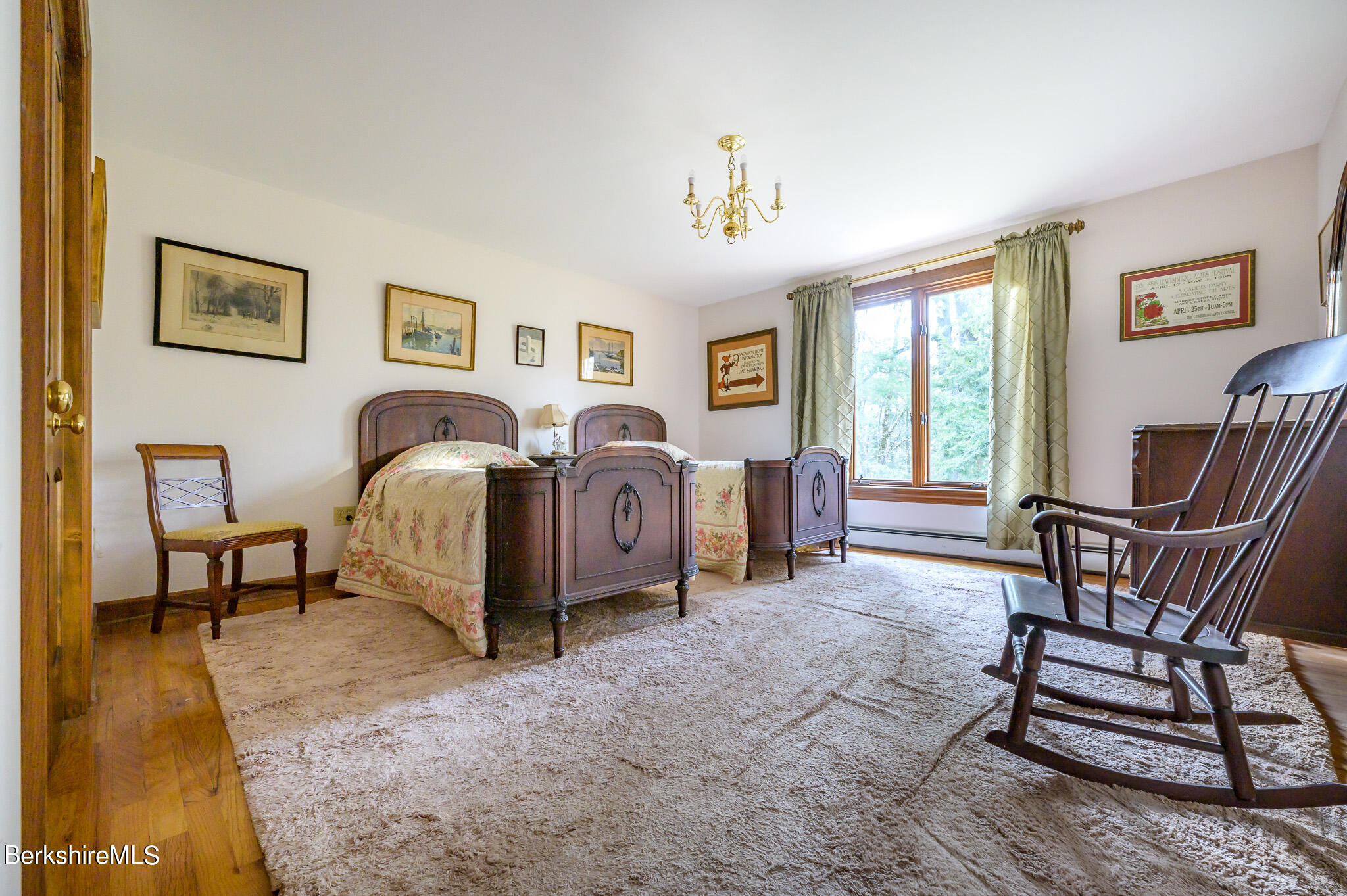 462 E Road Richmond, MA 01254 - Photo 28 of 49 a spacious bedroom with a bed and a large window
