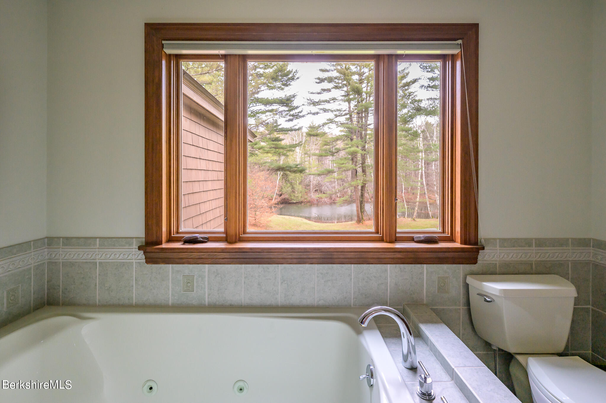 462 E Road Richmond, MA 01254 - Photo 32 of 49 a bathroom with a sink and a window