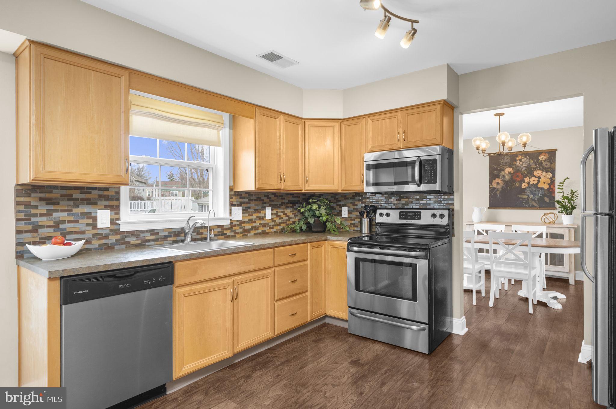 150 Nectar Run Telford, PA 18969 - Photo 13 of 41 a kitchen with stainless steel appliances granite countertop a stove and a sink