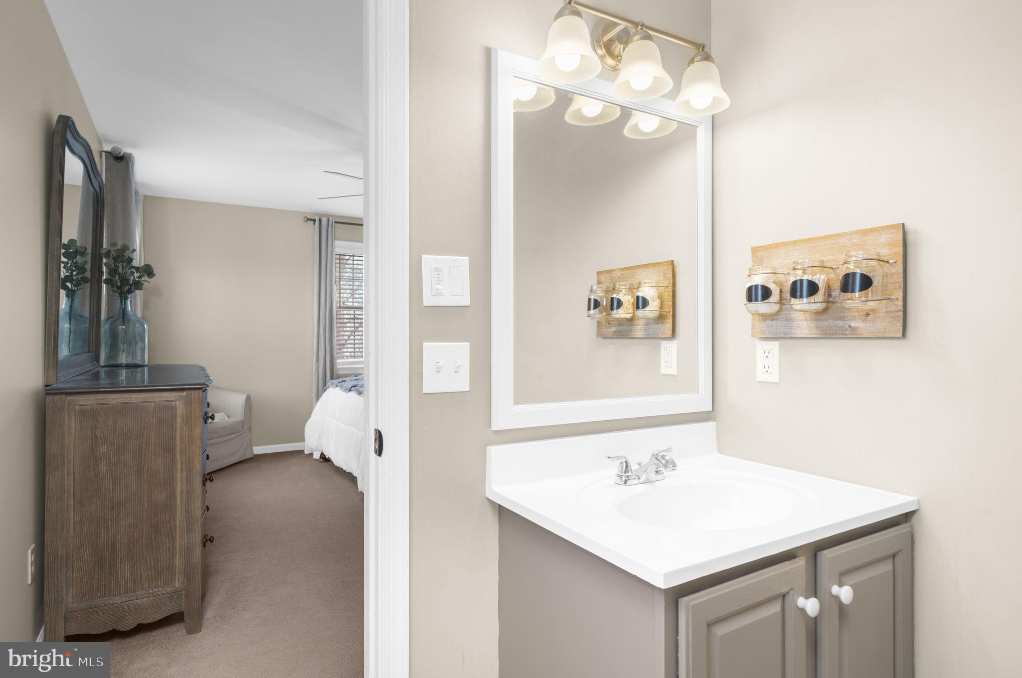 150 Nectar Run Telford, PA 18969 - Photo 23 of 41 a bathroom with a sink a mirror and a shower