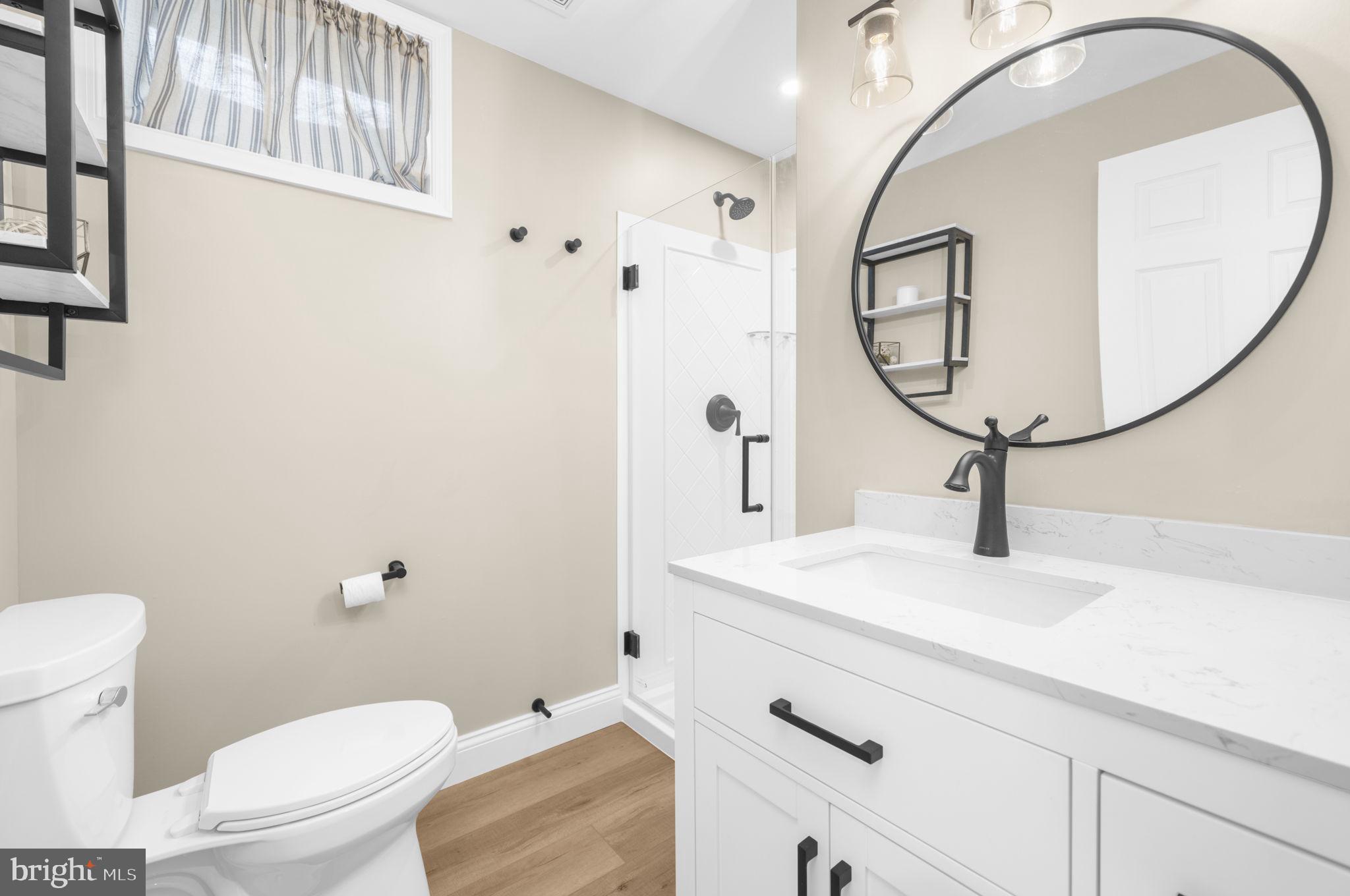 150 Nectar Run Telford, PA 18969 - Photo 33 of 41 a bathroom with a sink a toilet and a mirror