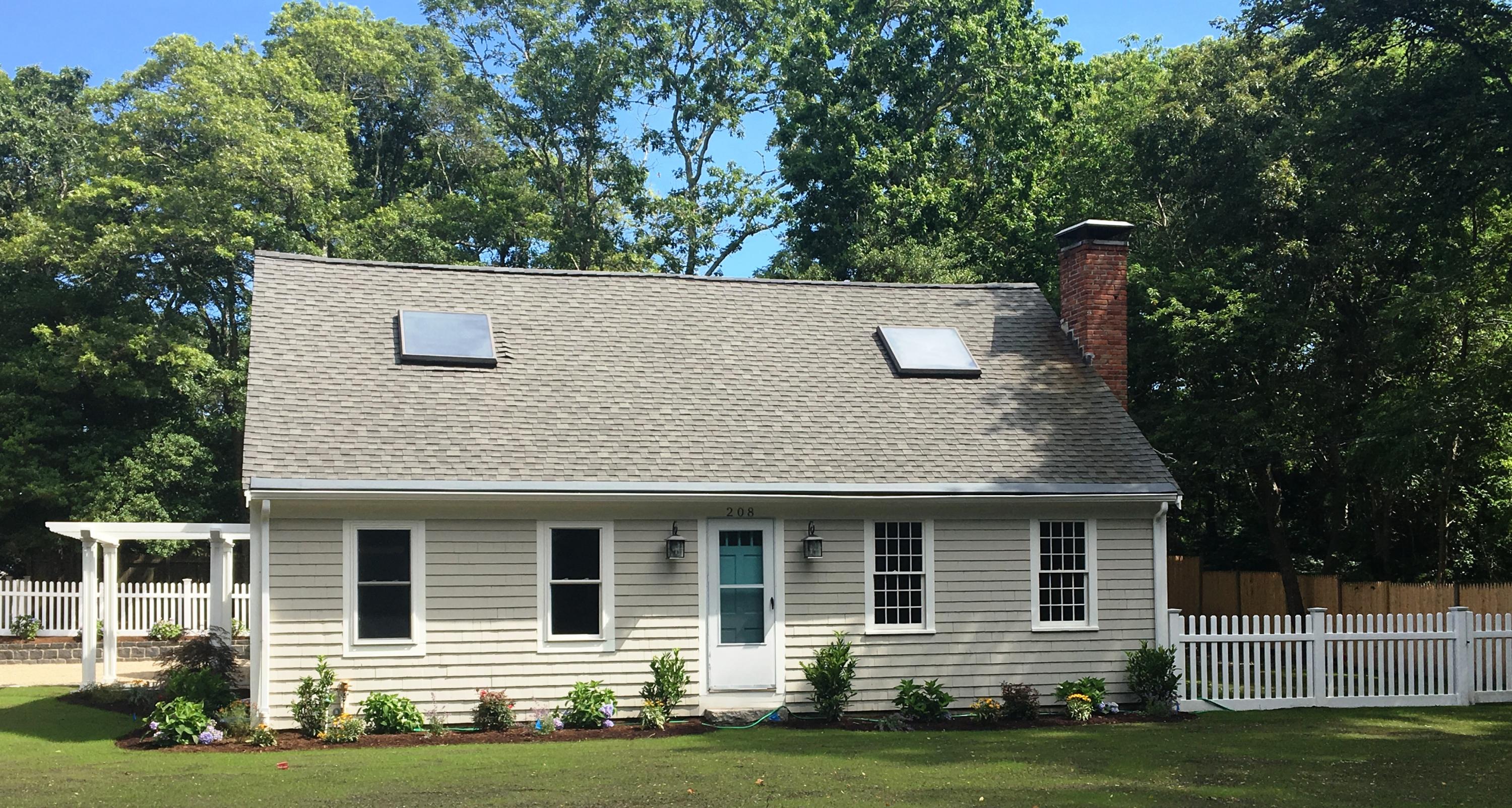 208 Great Marsh Road Centerville, MA 02632 - Photo 1 of 16 a view of a house with a yard